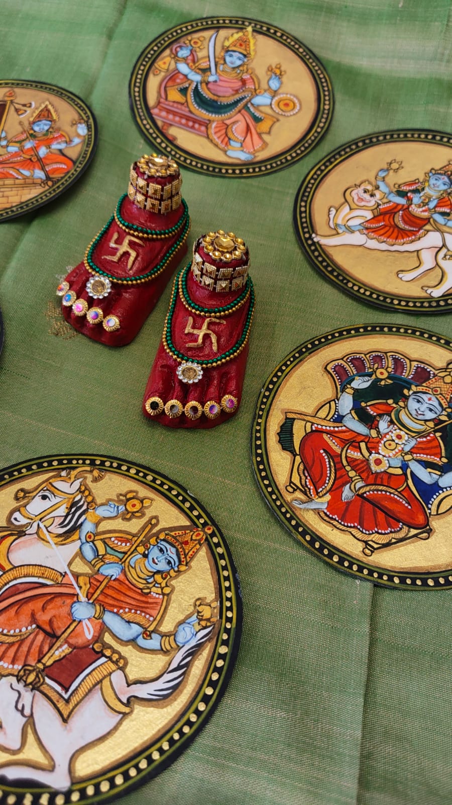 Mysore Ganjifa cards displayed on silk